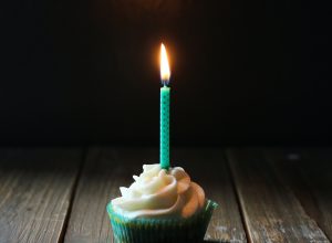 taper candle on cupcake